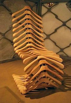 a stack of wooden spoons sitting on top of a table