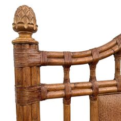 the headboard and foot board of a bed made out of wood with wicker