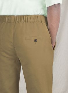 Everyone has cotton pants, but these pants still seem to get a bad rap. Our Easy Pants Tan Cotton Canvas are cut from soft 99% cotton and 1% lycra, promoting a good amount of breathability and custom fit with an adjustable drawstring waistband. It all adds up to make for less wispy, more functional summer pants. 
 
 Our pants are a versatile companion for all occasions. 
 
 Look Includes  Elastic Waistband  Zip fly With Button Closure  Internal Drawstring  Two Welted Back Pockets   
 You can cha Cotton Straight Leg Bottoms With Pull-on Style, Casual Cotton Pull-on Pants, Cotton Wide Leg Pants With Comfort Waistband, Wide Leg Cotton Pants With Comfort Waistband, Cotton Cargo Pants With Elastic Waistband, Cotton Pants With Comfort Waistband And Straight Hem, Cotton Wide Leg Sweatpants With Pull-on Style, Cotton Khaki Cargo Pants With Elastic Waistband, Casual Everyday Chinos With Side Pockets