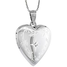 Product with Genuine Diamond This beautiful locket is made of sterling silver with excellent quality workmanship, which fits 2 photos. The engraved design is clear crisp and perfect, there is a bezel inside with a lens to keep the picture in place, and its rhodium plated to anti tarnish and a white gold look. You can also buy the locket together with a chain at a substantially discounted price. - This Medium size Heart Locket is 3/4 inch (19 mm) wide Starburst Set with a Genuine - Diamond and Bo Silver Round Locket Necklace For Valentine's Day, Silver Locket Necklace For Valentine's Day, Silver Heart Charm Locket Necklace, Silver Heart Cut Locket Necklace With Heart Charm, Silver Jewelry With Engraving Option For Valentine's Day, Classic Silver Heart Locket Necklace, Silver Locket Necklace With Heart Charm For Anniversary, Silver Heart Necklace With Round Pendant For Keepsake, Silver Heart Cut Locket Necklace For Valentine's Day