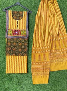 *Rural craft of rajasthan(India)* New in *#festivalcollection* *ajrakh  print Suit pcs with hand embroidery yoke*   Pure cotton Fabric with ajrakh print designer Salwar suit pc Along with ajrakh print Bottom & cotton  Duppatta Available in Attractive colors and designs  Lenght:  top: 2.5 mtr Bottom : 2.5 mtr Dupatta: 2.5 mtr Msp =3750 Limited stock Handloom and handcrafted ajrakh printed  suits and dupatta for women are here. Only Few Are in the Stock. Hurry Up! Please Note- Shades may slightly Bohemian Yellow Palazzo Set With Printed Motifs, Yellow Bohemian Palazzo Set With Printed Motifs, Bohemian Anarkali Set For Navratri With Printed Motifs, Bohemian Palazzo Set With Printed Motifs For Festivals, Bohemian Anarkali Set With Printed Motifs For Transitional Season, Bohemian Anarkali Set With Printed Motifs For Eid, Bohemian Chanderi Straight Kurta Anarkali Set, Bohemian Chanderi Anarkali Set With Straight Kurta, Bohemian Sets With Multicolor Embroidery And Printed Motifs