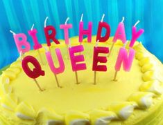 a birthday cake with candles that spell out the word queen on it's top