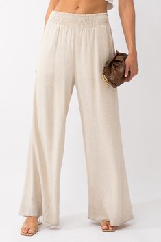 Take yourself to the beach in comfort and style with our Take me to the beach pants! These linen pants are lined for a cozy fit, and feature an elastic waistband and pockets for convenience. Look great and feel fabulous while soaking in the sun's rays! Summer Vacation Wide Leg Pants With Pull-on Style, Casual Lightweight Bottoms For Vacation, Lightweight Casual Bottoms For Vacation, Casual Flax Colored Bottoms For Vacation, Casual Linen Bottoms For Beach Season, Casual Flax-colored Bottoms For Vacation, Wide Leg Pants With Pockets For Beach Season, Lightweight Summer Bottoms For Vacation, Casual Beige Bottoms For Vacation