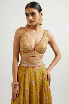 This stunning lehenga set features a beautifully embroidered lehenga, paired with a matching blouse and dupatta. The gold accents and vibrant threadwork create a youthful and joyous vibe, making this ensemble perfect for adding a touch of elegance and cheer to any special occasion. Mustard Lehenga, Gorgeous Lehenga, Indian Arts And Crafts, Nyc Studio, Embroidered Lehenga, Nehru Jackets, Indian Textiles, Western Wedding, Wedding Service