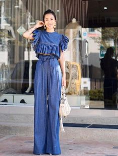 Chic Elegant and relaxed style with our matching Denim Set.- Layered Flounce Top- High waist Wide leg - Bow detail at frontPlease note you can ask us to adjust any of the measurements for our standard sizes listed below. Size 0Bust  30"  / 76 cmWaist 23.5"/ 60 cmHip   33"  / 84 cmThigh 19.5"/ 50 cmInseam 31" / 79 cmSize 2Bust  30"  / 76 cmWaist 25"  / 64 cmHip   34.5"/ 88 cmThigh 19.5"/ 50 cmInseam 32" / 81 cmSize 4Bust  32"  / 80 cmWaist 26"  / 66 cmHip   36.5"/ 92 cmThigh 20"  / 51 cmInseam 32 70s Mode, Thai Silk Dresses, Paper Bag Pants, Denim Set, 70s Vintage Fashion, Bag Pants, Bridal Shower Outfit, High Waisted Wide Leg Pants, Flounce Top