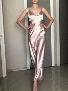 This silk satin slip dress can be worn as a bridesmaid dress, party and date dress and for many other occasions. Made of satin silk. DESCRİPTİON: -Adjustable straps. -Designed for a slim but relaxed fit. -Unlined. İt is a custom made dress, tailored according to your preferences, you can choose the length of the dress and order it with cut on the front. While ordering write your bust, waist and hips measure, so the dress will be made to your size. Please enquire if you're interested in different Luxury Silk Modal Satin Dress For Women, Silk V-neck Slip Dress For Prom, Elegant Pink V-neck Slip Dress, Wedding Dress With Satin Finish And Spaghetti Straps, Elegant Summer Bridesmaid Dress With Spaghetti Straps, Elegant Satin Bridesmaid Dress With Spaghetti Straps, Elegant Bridesmaid Slip Dress With Spaghetti Straps, Bias Cut Slip Dress For Prom, Chic Silk Slip Dress For Bridesmaids