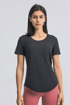 Size: Relax fit Pattern: Plain Feature: Short sleeve. curve hem. pullovers Neckline: Crewneck Sheer: No Stretch: Highly stretchy Measurements: Size 4: length 24 in. bust 36 in. underbust 37 in. sleeve 7 inSize 6: length 25 in. bust 37 in. underbust 39 in. sleeve 7 inSize 8: length 25 in. bust 39 in. underbust 40 in. sleeve 7 inSize 10: length 26 in. bust 41 in. underbust 42 in. sleeve 7 inSize 12: length 26 in. bust 42 in. underbust 43 in. sleeve7 in Material composition: 80% nylon. 20% spandex Care: Machine wash cold. Tumble dry low. Imported Shipping time: 5-10 business days Athleisure Short Sleeve Crew Neck Top For Workout, Sporty Stretch Short Sleeve Workout Top, Sporty Stretch Short Sleeve Top For Workout, Solid Color Scoop Neck Gym Top, Sporty Scoop Neck Top, Fitted Scoop Neck Sportswear Top, Stretch Athleisure Short Sleeve Top For Workout, Stretch Athleisure Short Sleeve Top, Solid Stretch Short Sleeve Top For Athleisure