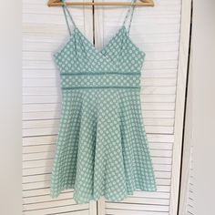 This Beautiful Mint Green Dress From Trixxi Clothing Company Features White Embroidered Flowers And A Flattering Fit & Flare Style. The Dress Is Fully Lined, Has A V-Neckline And Is Sleeveless, And A Short Length Of 30". It Is Made Of 100% Cotton With A Chambray Feel And Embroidered Floral Design. Perfect For Any Occasion, This Dress Is Great For Weddings, Parties, Or Casual Outings. It Is Juniors Size Large And Has A Chest Size Of 32". The Dress Is Easy To Care For And Comfortable To Wear, Spag V-neck Cotton Sundress With Lace Trim, Cotton V-neck Sundress With Lace Trim, Cotton Fit And Flare Lined Dress, Cotton Fit And Flare Dress With Lining, Fitted Lace Sundress, Cotton V-neck Lined Sundress, Spring Lace Mini Dress With Lining, Spring Cotton Fit And Flare Dresses, Spring Lace Mini Dress Lined