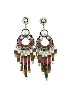 Bold and beautiful, these chandelier earrings mix the classic with the traditional. The sterling silver is accented by the incorporation of Peru's traditional weaving of bright colors in the charms. This unique (and fun!) statement piece will instantly liven up any outfit. Product Details: 950 Solid Sterling Silver Woven Textile Weight: 10.7 g each Drop Length: 2 ¾” Total Length: 3 ⅜" Handcrafted in Peru Woven Chandelier, Sterling Silver Jewelry Earrings, Weaving Textiles, Traditional Weaving, Bold And Beautiful, Chandelier Earrings, Bright Colors, Statement Pieces, Peru