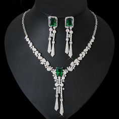 Complete your bridal look with this stunning CZ Crystal Bridal Jewelry Set. The combination of rhinestones and crystals adds a touch of elegance and sparkle to your wedding ensemble. Elevate your style and make a statement on your special day with this exquisite jewelry set.
– This bridal several cubic zirconia gemstone necklace set is perfect for adding elegance to any bridal ensemble. – Made with high-quality materials, this set includes a stunning necklace and matching earrings for a complet Luxury Multicolor Wedding Necklace, Luxury Engagement Necklaces For Valentine's Day, Elegant Crystal Bridal Sets With Rhinestones, Elegant Bridal Sets With Rhinestones And Crystal, Sparkling Diamond Jewelry Set For Wedding, Wedding Jewelry Sets With Rhinestones In Cubic Zirconia, Wedding Jewelry Sets With Rhinestones And Cubic Zirconia, Sparkling Diamond Wedding Jewelry Sets, Dazzling Crystal Bridal Sets With Sparkling Stones