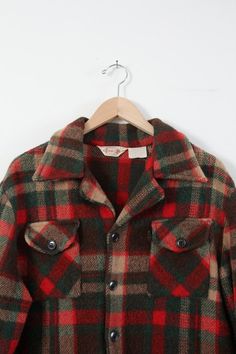 circa 1970sThis is a vintage plaid men's jacket by Career Club. The soft wool blend coat features a red, green, brown, and cream plaid. Button pockets are on the chest and waist. It buttons closed, and features button cuffs. • Career Club shirt jacket• wool blend• red, green, and brown plaid• 4 pocket• button closuresCONDITIONIn good, vintage condition. MEASUREMENTSBust: 23"Length: 26.5"Shoulders: 20"Sleeves: 15.5"Outer Sleeve: 23"HOW WE MEASURE→ Shirt measured lying flat→ Bust measured armpit t Plaid Wool Coat, 70s Men, Mens Outdoor Clothing, Wool Clothing, Flannel Jacket, Wool Shirt, Mens Flannel, Wool Blend Coat, Brown Plaid