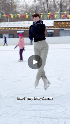 a woman is jumping in the air on an ice rink while two children are skating behind her