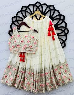 Presenting New Navratri Collection Lehenga Choli With Full Heavy Embroidery Sequence Work 💃*Lehenga Fabric   :*Heavy Faux Georgette With Heavy Embroidery Sequence Work With Latkan Dori*  💃*Lehenga Inner :* Micro Cotton 💃*Lehenga Length :* 42-43 Inch  💃*Choli  Fabric:* Heavy Faux Georgette With Heavy Embroidery Sequence Work and Attached *Cups*  Lehenga size : Up To M(38) L(40) XL(42) (Fully Stiched ) 💃*Dupatta Fabric :* Heavy  Georgette With Embroidery Sequence Work And Embroidery Sequence White Semi-stitched Bollywood Choli, Semi-stitched White Choli With Zari Work, Festive Semi-stitched Choli With Multicolor Embroidery, Semi-stitched Choli With Multicolor Embroidery, White Semi-stitched Georgette Choli, Traditional Lehenga, Ivory Lehenga, Lehenga Choli For Women, Choli For Women