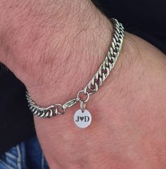 Personalized gifts such as a link chain bracelet are a thoughtful gift for him. Crafted from high-quality silver stainless steel, this chain bracelet features a sophisticated design that is both stylish and durable. Perfect for everyday wear or special occasions, this bracelet makes a great gift for yourself or a loved one. Add a touch streetwear style to your outfit with this sleek and modern accessory. 👉 Custom engraving on bracelets with a special message, whether it's initials, initials wit What To Get Your Man For Christmas, Boyfriend Gifts Bracelets, Silver Gifts For Men, Men’s Chain Bracelet, Mens Silver Bracelets Unique, Engraved Cuban Link Bracelets As Gift, Silver Curb Chain Jewelry For Father's Day, Silver Cuban Link Chain Bracelet As A Gift, Engraved Stainless Steel Chain Link Jewelry