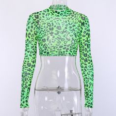 Material: Polyester Material: Spandex Clothing Length: Short Gender: Women Decoration: None Fabric Type: Broadcloth Pattern Type: Leopard Sleeve Length(cm): Full Model Number: 90406 Sleeve Style: REGULAR Collar: Mandarin Collar Style: Sexy & Club color: NeonGreen season: Autumn,Winter style: Fashion ,Streetwear,Casual Fabric: mesh Green Long Sleeve Top For Club, Green Stretch Top For Club, Fitted Green Mesh Top, Trendy Green Top For Club, Green Sheer Mesh Top, Sheer Green Mesh Top, Sheer Stretch Crop Top For Club, Trendy Fitted Green Mesh Top, Green High Stretch Party Tops