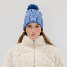 A winter classic. The Ida is a chic cable knit beanie with a classic silicon Gigi Pip label + fluffy faux fur pom in 3 staple colors. This lightweight fold over style is exactly what you need to keep you warm throughout the chilly winter szn, whether your home town is a snowy tundra or even just gets below 50's! Create the ultimate monochromatic winter look by pairing with other popular styles from the Winter Resort Collection HERE! Winter Cable Knit Beanie One Size, Winter Cable Knit Beanie, Casual Cable Knit Beanie For Winter, Cozy Cable Knit Winter Beanie, Cozy Cable Knit Beanie For Winter, Cozy Cable Knit Winter Hat, Fall Cable Knit Beanie For Cold Weather, Winter Cable Knit Hats For Cold Weather, Cozy Cable Knit Beanie For Cold Weather