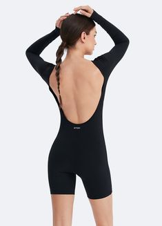 Make a statement with our U-Back Long Sleeve Bodysuit, combining elegance with comfort. The open back adds a polished touch, with the soft, stretchy fabric designed for day-to-night comfort. Elegant Stretch Swimwear With Scoop Back, Elegant Scoop Back Stretch Swimwear, Sleek Stretch Bodysuit For Loungewear, Black Backless Bodysuit With Minimal Stretch, Sleek Second-skin Backless Leotard, Sleek Bodysuit With Scoop Back For Swimming, Sleek Stretch Leotard With Lined Body, Black Second-skin Backless Leotard, Sleek Low Back Bodysuit For Swimming