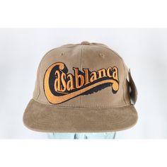 Nos Vintage 90s American Needle Movie Classics Casablanca Snapback Hat Brown Mens Hat New With Tags Adjustable Cotton Blend Brown Check Out My Other Items In My Store! Brown Hat Bin Vintage White Trucker Hat With Short Brim, White Retro Snapback Hat With Curved Brim, Vintage Short Brim Snapback Hat For Streetwear, Retro Cream Hat With Curved Brim, Retro White Snapback Hat With Flat Brim, White Retro Snapback Hat With Short Brim, Vintage Short Brim Hat For Streetwear, Vintage White Flat Brim Hat, Vintage White Trucker Hat With Curved Brim