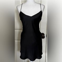 Super Cute Brand New Amazing Condition Simple, Sexy Black V-neck Mini Dress With Built-in Bra, Cami Mini Dress With Built-in Bra For Date Night, Chic Slip Dress With Built-in Bra For Night Out, Black Flirty Sleeveless Slip Dress, Flirty V-neck Slip Dress For Night, Black Flirty Slip Dress With Spaghetti Straps, Black Dress With Built-in Bra For Night, Flirty Black V-neck Slip Dress, Black Camisole Slip Dress