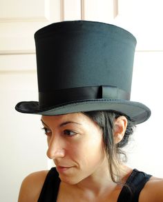 This simple and elegant victorian inspired top hat is covered in a beautiful black satin with a gentle shine .It is finished off with matching colored ribbon around the crown. Need this TOP HAT in another color? with more decoration? Just send me a message to talk about a custom hat made just for you! This hat is fully lined with satin and it is made to according to your exact head measurement making it suitable for both men and women who want a bit more on their head than a mini hat! IMPORTANT Victorian High Crown Costume Hat, Vintage Fitted Top Hat For Costume Party, Steampunk Fitted Brimmed Top Hat, Victorian Fitted Brimmed Costume Hats, Victorian Fitted Hats For Costumes, Steampunk Fitted Top Hat For Costume, Victorian Fitted Costume Hats, Victorian Style Fitted Costume Hats, Fitted High Crown Hat For Costume Party