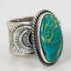 Sterling Silver Ring with Intricate Hand Stamped Designs and set with Natural Royston Turquoise from Nevada by Navajo Silversmith, Sunshine Reeves. Ring Size: 7.75.5” Setting Width, .875” Setting Height.5” Band Width Large Turquoise Ring, Zuni Jewelry, Concho Belt, Navajo Jewelry, Royston Turquoise, Southwestern Jewelry, Pendant Rings, Stamp Design, Ring Size 7