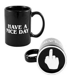 two black coffee mugs with white lettering on them, one has a hand and the other has a finger