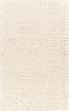 a white rug with an intricate design on it