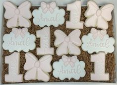 Set comes with a dozen cookies as pictured. Each cookie comes individually heat sealed for freshness. Please leave the name and age at checkout. Cookie sets on our website are sold as pictured. We can customize the names/ages/colors. If you would like something more custom please contact us for a custom order. Our Signature Sugar cookies are flavored with a hint of nutty flavor (made with Almond) with notes of citrus and vanilla and iced with a Vanilla Icing. We are not a Peanut/Nut Free Commercial Kitchen. Bow Sugar Cookies Royal Icing, Coquette Cookies Decorated, Coquette Sugar Cookies, Onederful Birthday Cookies, Bow Sugar Cookies, Coquette Cookies, Bow Cookies, 1st Birthday Cookies, Birthday Sugar Cookies