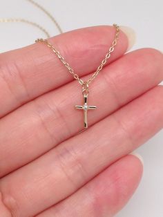 925 Sterling Silver Dainty Cz Cross Pendant Necklace   - Metal: 925 Sterling Silver (Finish: Yellow Gold Plated) - Stone: Clear Cubic Zirconia (1 Cz), Round - Shape: Cross - Pendant Dimension: 9mm(0.35 in) x 6mm(0.24 in) x 1mm, Thickness 1mm (Please note that the cross' width/thickness is 1mm, VERY TINY/THIN.) - Light Cable Chain: 18" Adjustable (16" + 1" + 1"), Lobster Clasp - Color: Gold Gold Cross Necklace For Women, Cross Necklace Gold, Diamond Cross Necklace Gold, Tiny Cross Necklace, Dainty Cross Necklace, Silver Cross Necklace, Sterling Silver Cross Necklace, Tiny Cross, Gold Cross Necklace