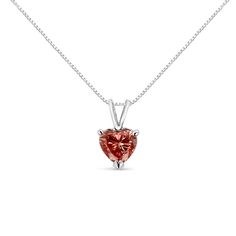 An elegant heart-shaped diamond is the brilliant focal point of this solitaire necklace for her. Set in 14K white gold, this stunning, pink lab grown diamond suspends from an 18-inch box chain that secures with a spring ring. The diamond is masterfully set in a 3 prong, martini setting for maximum dazzle. The simplicity of a perfect diamond will outlast every other piece you own. A brilliantly cut heart shaped diamond emanates pure elegance and love in its gold setting. Goes with anything you care to pair it with – another reason why you'll never want to take this one off. This sweet necklace makes a perfect Valentine's Day gift, or as a way to remember someone close to your heart. It's a classic and feminine piece she'll want to show off every day. Martini Set, Diamond Heart Pendant Necklace, Sweet Necklace, Solitaire Necklace, Pure Elegance, Solitaire Pendant Necklace, Heart Necklace Diamond, Heart Diamond, Solitaire Necklaces