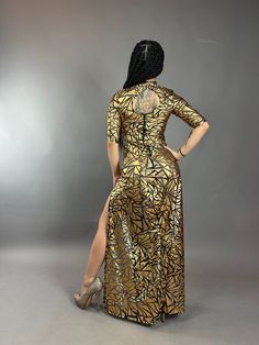 Introducing our Gold Showgirl Costume - a glamorous dress tailored for parties, Gogo gigs, and clubwear, making it the ultimate choice for dance shows or a fun night out with friends! Crafted from premium 4-way stretch Power Mesh embellished with a metallic hologram triangle shape print, this dress exudes sophistication and allure and adds a touch of mystique to your look, ensuring you captivate every gaze. Available in a range of stunning colors, this dress allows you to express your unique style effortlessly. -Featuring three-quarter sleeves for a touch of refinement. -Boasting a chic 1.5-inch turtleneck neck for added style and warmth. -Complete with a back zipper adorned with a striking teardrop opening, fastened securely with a snap button at the back of the neck. This dress combines Futuristic Clothing, Showgirl Costume, Catsuit Costume, Glamorous Dress, Festival Mode, Exotic Dance, Glamorous Dresses, Festival Dress, Women's Costumes