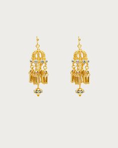 These retro drop earrings are reminiscent of traditional jhumka earrings, crafted like tiny cages holding mysterious little elves. Their delicate, intricate parts make crispy, subtle whispers by your ears. They catch the light as they sway with your every move, sprinkling shimmering sparkles on your skin. Hey, actually, wearing them makes you look as delightful as an elf! 🧚💛 Materials: 18k gold plated brass Measurement: 52mm/2.04" in length, 16mm/0.63" in width Festive 22k Gold Drop Earrings, 22k Gold Latkan Earrings For Celebrations, Traditional Gold-plated Danglers, Traditional Gold Plated Danglers, Festive 22k Gold Earrings, Gold Plug Earrings For Festive Celebration, Festive Gold Plug Earrings For Celebration, Festive Celebration Gold Plug Earrings, Traditional Gold-plated Earrings For Festivals