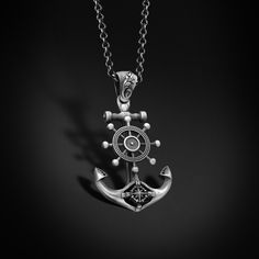 Silver Anchor Pendant with Compass, Ship Wheel Silver Nautical Anchor Necklace, 925k Sterling Mens Pendant, Father's Day Gift for Sailor Him Looking for a gift? You've found the perfect item for this! All our products are made in 925 sterling silver, the highest quality precious metal. In our workshop, everything is carefully handled in happy hands. A classic and beautiful necklace that will suit any style of clothing, everyday or event. Our products will be with you in every special moment! For any questions regarding this piece or our collection please reach out. We love talking to our customers. ITEM DETAILS GENDER : Male / Female MATERIAL : 925K Sterling Silver COLOR: Oxidized  Silver ◆ WEIGHT : 15 Grams ( ONLY PENDANT )  ◆ DIAMETER : 1,18 - 3,50 Cm  BAIL WIDTH : Suitable for up to 0.5 Classic Silver Anchor Jewelry, Gifts For Sailors, Anchor Pendant, Anchor Necklace, Ship Wheel, Nautical Anchor, Personalized Pendant, Mens Pendant, Precious Metal