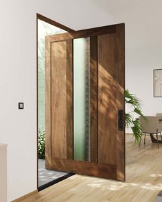 an open wooden door in the middle of a room