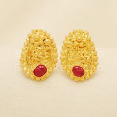 Elevate your style with these beautifully handcrafted gold earrings. Featuring a classic design and a comfortable fit, they add a refined touch to any look. Ideal for everyday wear or special occasions, they bring a subtle yet sophisticated sparkle. 22k Gold  Stud Earrings Metal is Real Gold Purity is 22kt  Weight is 4.15 grams approx Max Length is 1.9 cm approx Max width is 1.4 cm approx ,  The Earrings comes with normal backs if you need gold screw please contact Please feel free to ask if you Elegant Yellow Gold Earrings For Puja, Elegant Intricate Design Earrings For Puja, Elegant Gold Bridal Earrings For Puja, 22k Gold Earrings For Diwali Anniversary, Elegant Earrings For Diwali Puja, Elegant Earrings For Puja And Diwali, 22k Gold Elegant Temple Jewelry Earrings, 22k Gold Temple Jewelry Earrings With Elegant Design, Elegant 22k Gold Temple Jewelry Earrings