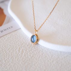 This minimalist oval Aquamarine necklace is a timeless piece of jewelry. Aquamarine is the birthstone for the month of March. It's a beautiful gemstone with a calming blue color reminiscent of the ocean, often symbolizing tranquility, courage, and clarity. With its understated design and vintage style, this necklace serves as a perfect gift for her, encapsulating both classic charm and the soothing allure of Aquamarine. Its simplicity ensures versatility, allowing it to complement any outfit or occasion, making it an ideal addition to any jewelry collection. DETAILED DESCRIPTION// NECKLACE: Length: 40+3cm Stone size: 8mm *9mm  Material: 14k gold filled s925 sterling silver with blue aquamarine  (Please take note that aquamarine is a some transparent stone that exhibits varying shades of re Blue Clavicle Chain Necklace As A Gift For Her, Elegant Blue Oval Cabochon Necklace, Blue Round Pendant Necklace For Her, Blue Oval Gemstone Necklace, Blue Round Pendant Necklace As Gift For Her, Oval Gemstone Necklace For Her, Blue Gemstone Necklace With Oval Cabochon, Blue Oval Pendant Necklace In Dainty Style, Blue Oval Pendant Necklace With Birthstone