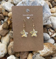 "Perfect for summer and beach vacations. These stunning crystal starfish earrings are made from Clear AB Crystal Starfish. They reflect the colors around them and glisten in the sun. The starfish are 14mm wide and are dangling from gold plated French hooks.  Any beach lover will love these.  You can choose between the earrings alone, or the gift set.  In the gift set, the stunning starfish crystal earrings will arrive  adorably packaged in an organza gift bag, with the \"starfish story\" card in The Starfish Story, Starfish Story, Antique Silver Earrings, Vacation Jewelry, Starfish Earrings, Beach Vacations, Themed Gifts, Gifts For Teachers, Ankle Bracelet