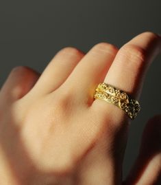 Add a touch of elegance, wrapped around your finger. Our Gold Filigree Wedding Ring Band features delicate floral motifs and kalado (lace-like) patterns.  Handcrafted in gold filigree, a meticulous and rare technique perfected by the plateros of Ilocos Sur. The artistry of gold filigree craftsmanship has been practiced Filipino Design, Ilocos Sur, Filigree Wedding Ring, Wedding Purse, Cufflinks Wedding, Silver Coat, Wedding Jewelry Earrings, Gold Filigree, Filigree Ring