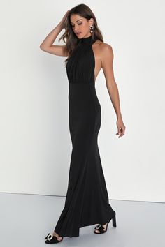 Classic glamour like the Lulus Romantic Chance Black Halter Backless Mermaid Maxi Dress will always impress! Slinky jersey knit fabric shapes this sultry dress that has a modified halter neckline with loop button closures. Bodice boasts a gathered design and a stunning open back that's sure to have all eyes on you! Skirt falls in a mermaid silhouette, finishing at a maxi hem. Hidden zipper/clasp at back. Fit: This garment fits true to size. Length: Floor length. Size medium measures 61" from top Fitted Maxi Dress With Ruched Back For Gala, Stretch Maxi Dress With Ruched Back For Gala, Glamorous Fitted Backless Dress For Gala, Fitted Halter Dress With Keyhole Back For Evening, Elegant Backless Bodycon Evening Dress, Formal Halter Neck Maxi Dress With Ruched Back, Elegant Backless Bodycon Dress For Gala, Chic Evening Bodycon Dress With Keyhole Back, Chic Halter Dress With Cowl Back For Evening