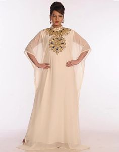 Subhanallah Dubai Off White Georgette Hand Embroidery Party Wear Kaftan 👗 Buy latest Kaftan which are made up from best quality fabrics with latest styles from our large collections at arabicattire.com Shop Now : https://bit.ly/3zHLaFh Buy online @ $67 #designerkaftan #kaftandressespakistani #kaftangown #kaftannearme #kimonokaftan #pakistanikaftandress Luxury Wedding Tunic For Eid, Luxury Beige Thobe For Eid, Luxury Eid Thobe With Zari Work, Luxury Reception Kaftan For Eid, Luxury Bollywood Thobe For Eid, Eid Georgette Kaftan With Zari Work, Bollywood Style Embellished Georgette Kaftan, Bollywood Style Evening Kaftan With Resham Embroidery, Long Sleeve Kaftan With Mirror Work For Diwali