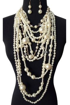 - Pearl Layered Chunky Statement Necklace - Multi-Layered 1920 Gatsby Style Chunky Pearl Statement Necklace Set - 14 inch long Necklace Itself High with 2 inch Long Earrings - Weight: 0.8 Lb - Lobster claw extension chain attached Chunky Pearl Statement Necklace, 1920 Gatsby, Body Necklace, Layered Pearl Necklace, Chunky Pearls, Pearl Statement Necklace, Chunky Statement Necklace, Long Pearl Necklaces, Bamboo Earrings