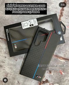 the case is black and has blue lines on it, with a red stripe at the bottom