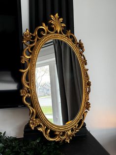 Vintage Syroco Mirror - 29" x 19" Add a touch of vintage elegance to your home with this stunning Syroco mirror. Measuring 29 inches by 19 inches, this ornate piece features a beautifully detailed frame, embodying the charm and craftsmanship of vintage decor. The intricate floral and scrollwork design adds a classic, timeless appeal, making it a perfect focal point for any room. This mirror is not only a functional item but also a piece of art that enhances the aesthetic of any space. Ideal for Mirror On Table, Syroco Mirror, Scrollwork Design, Vintage Gold Mirror, Asymmetrical Mirror, Mirror Gallery, Victorian Mirror, Mirror Gallery Wall, Gold Framed Mirror