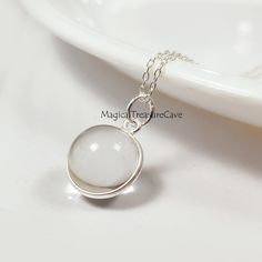 "Natural Clear Quartz Necklace, 925 Sterling Silver Jewelry, Quartz Ball Design Necklace, Minimalist Necklace, Bridesmaid Gift, Wedding Gift  : D E T A I L S : Handcrafted with lots of love ♥ and care Gemstone- Clear Quartz  Finish: Silver  Closure: Lobster clasp Measurement: Length: 17\" Extender: 2\" Pendant Size: Width: 13.2 mm, Length: 20 mm Our Jewelry is Gold polished on 925 sterling silver metal. This piece of jewelry is perfect as a gift for yourself, for a friend, a gift for Valentine's day, or a birthday. Magical Treasure Cave: Please check out the rest of our shop by clicking: https://www.etsy.com/in-en/shop/MagicalTreasureCave QUESTIONS: We are always happy to answer any of your questions, so please contact us via convo, we would love to hear from you! : C A R E : Please do not Adjustable Simple Silver Necklaces, Sterling Silver Hypoallergenic Charm Necklace, Hypoallergenic Sterling Silver Round Charm Necklace, Hypoallergenic Sterling Silver Charm Necklaces, Simple Nickel-free White Jewelry, Hypoallergenic Sterling Silver Charm Necklace, Simple Sterling Silver Jewelry For Formal Occasions, Simple White Round Pendant Necklace, Simple White Nickel-free Jewelry