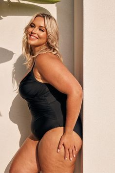 Black Plus Size Bandage One Piece Wrap your curves in this sexy and supportive black one piece swimsuit. The Criss Cross one piece is a flattering and supportive swimsuit that hugs you in all the right places. The criss cross detail is designed to draw the eye to the top half of the body while creating a gorgeous silhouette. Your bust will feel supported and shaped while the ribbons of ruching show off your waistline. Pair this chic plus size one piece with a generous mesh sarong to complete you Supportive Swimsuit, Swimwear Australia, Plus Size One Piece, Plus Size Swim, Black One Piece Swimsuit, Curvy Swimwear, Black Swimwear, Swim Fashion, Swimsuit Tops