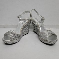 * Nwot- New, Never Worn * Top Seller And Top Rated Seller, 5.0 Rating * Poshmark Ambassador Ii Achieved * Same Day Shipping Womens Shoes Wedges, Silver Glitter, Wedge Sandals, Wedges, Sandals, Women Shoes, Women Shopping, Silver, Color