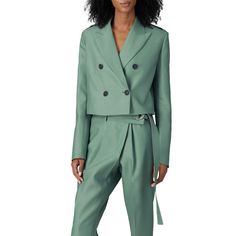 Green wool (71% Virgin Wool, 29% Silk). Jacket. Long sleeves. Exposed font button closure. 20.5" from shoulder to hemline. Imported. Shown here with SCHUTZ Shoes. Formal Cropped Outerwear With Double-breasted Button, Tailored Cropped Jacket With Button Cuffs, Tailored Long Sleeve Cropped Jacket With Button Cuffs, Formal Double-breasted Cropped Jacket With Buttons, Elegant Wool Cropped Jacket With Buttons, Tailored Cropped Jacket With Buttons For Formal Occasions, Formal Cropped Blazer With Double-breasted Button Fastening, Business Cropped Jacket With Long Sleeves And Hidden Buttons, Business Cropped Jacket With Hidden Button Closure