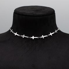 Cross (Crucifix) Link Chain. A stunning minimalist stainless steel choker, perfect for layering. 18mm x 8mm Width Stainless Gothic Cross Link Chain 4 Inch 4.7mm Stainless Steel Adjuster Chain Hand Made in the UK Sizing: Small 11 - 15 Inches (28cm - 38cm) Medium 13 - 17 Inches (33cm - 43cm) Large 15 - 19 Inches (38cm - 48.5cm) Adjustable Stainless Steel Choker With Clavicle Chain, Adjustable Stainless Steel Clavicle Chain Choker, Stainless Steel Clavicle Chain Choker Gift, Silver Stainless Steel Choker With Adjustable Chain, Silver Minimalist Cross Necklace With Clavicle Chain, Silver Stainless Steel Choker With Clavicle Chain, Silver Cross Metal Choker, Hypoallergenic Silver Choker Necklace, Adjustable Silver Stainless Steel Choker