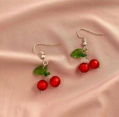 Handmade cherry earrings. Available in your choice of metal colour. Hook back design fits comfortably and securely without additional backing. Cherry Dangle Earrings With Ear Wire, Cherry Colored Drop Earrings With Ear Wire, Cherry Drop Earrings With Ear Wire, Cherry Color Dangle Earrings, Cherry Nickel-free Trendy Jewelry, Trendy Cherry Nickel-free Jewelry, Cherry Color Trendy Nickel-free Jewelry, Nickel Free Cherry Earrings For Gift, Nickel Free Cherry Colored Earrings For Gift