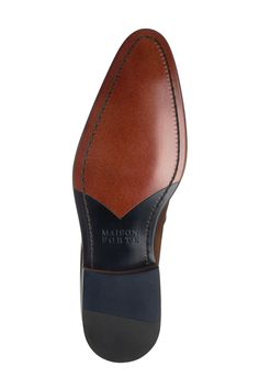 This leather constructed loafer features an almond toe and buckle strap.Sizing: True to size. M=standard width- Almond toe- Buckle strap vamp- Leather construction- Lightly padded insole- Topstitched detail- Stacked block heel- Welt stitching - Imported Leather upper, manmade sole Leather Pointed Toe Moccasins With Brogue Detailing, Fitted Leather Sole Plain Toe Moccasins, Fitted Leather Sole Moccasins With Plain Toe, Brown Pointed Toe Dress Shoes With Removable Insole, Leather Sole Pointed Toe Monk Strap Shoes, Pointed Toe Monk Strap Shoes With Leather Sole, Leather Moccasins With Pointed Toe And Leather Sole, Leather Moccasins With Pointed Toe, Monk Strap Shoes With Leather Sole And Pointed Toe